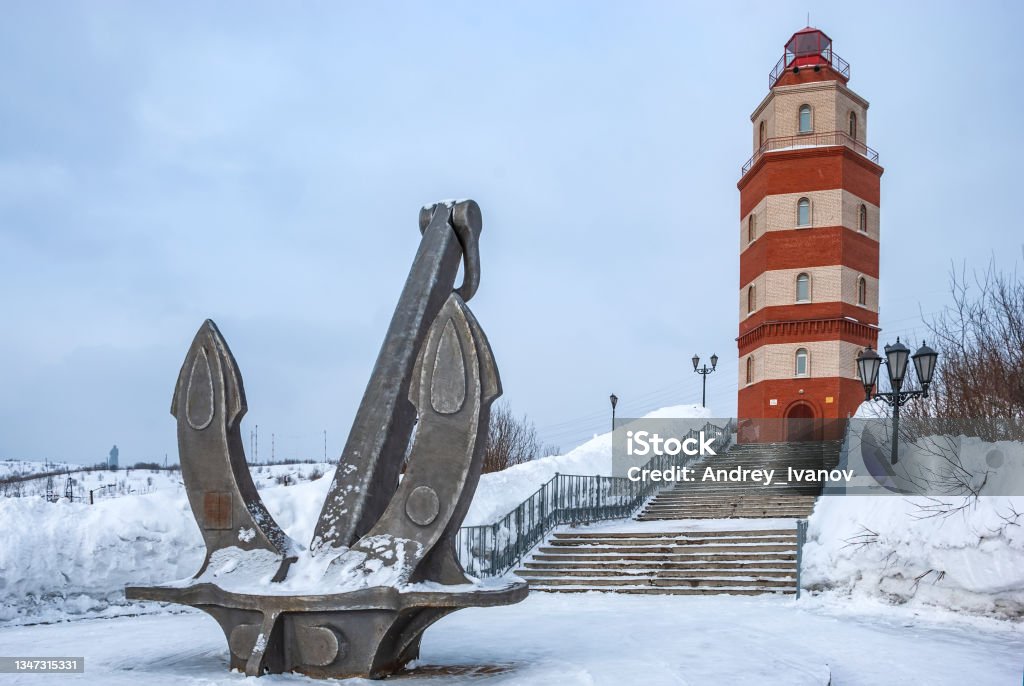 Murmansk city in winter. Lighthouse - a memorial to sailors who died in peacetime. Kola Peninsula. Murmansk Stock Photo