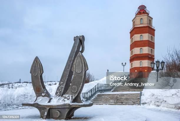 Murmansk City In Winter Lighthouse A Memorial To Sailors Who Died In Peacetime Kola Peninsula Stock Photo - Download Image Now