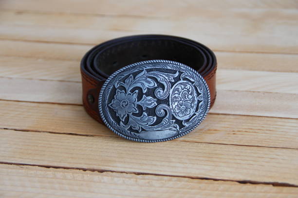 istock Leather cowboy belt on wooden background 1347315460