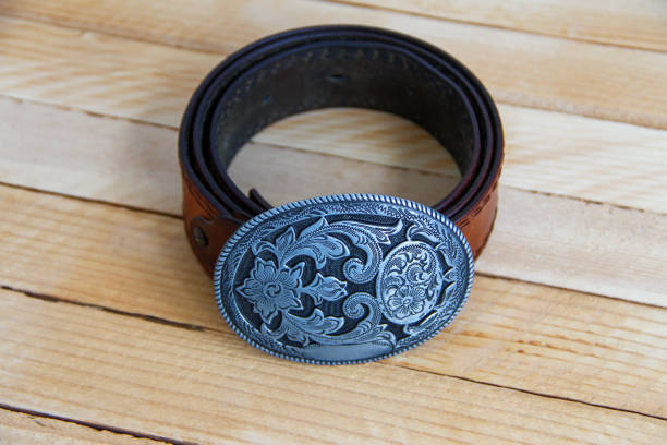 Leather cowboy belt on a wooden background
