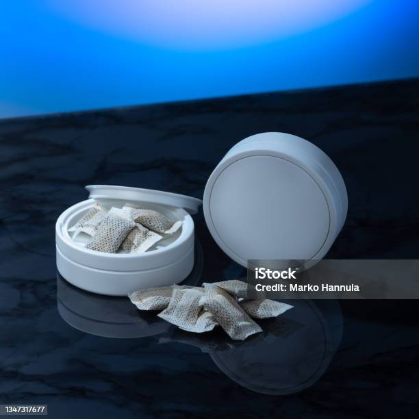 Closeup Of A White Swedish Snus Can And Portion Snuff Pouches Stock Photo - Download Image Now