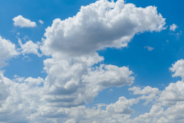 istock Beautiful blue sky with whipped white clouds that are illuminated by the sun 1347318067