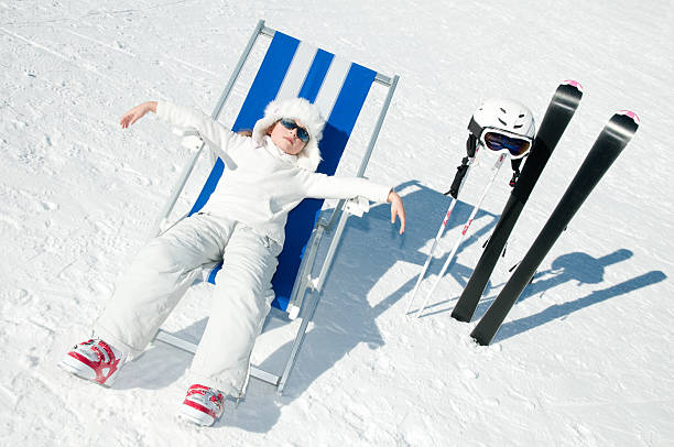 Ski vacation Young skier in winter resort apres ski stock pictures, royalty-free photos & images