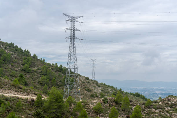 istock High voltage electrical towers near the mountains 1347321226