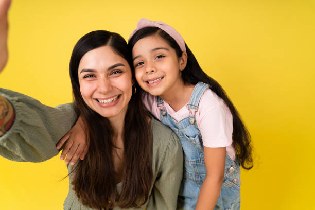 istock Mother posting a photo on social media 1347321740