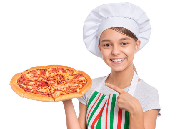 istock Girl chef holding pizza on white 1347328276