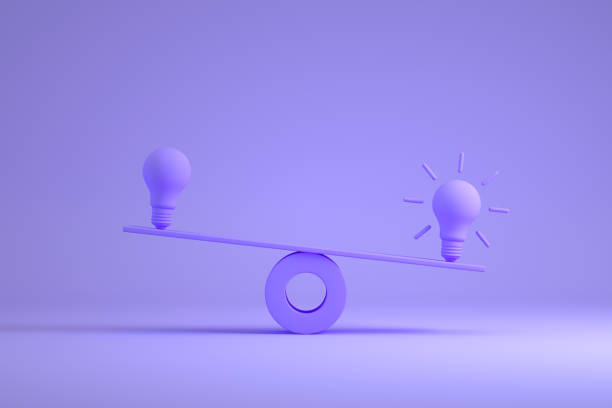 Light bulb on balance board, new idea background