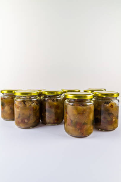 istock Batch of home made marrow chutney jars, portrait. 1347332621