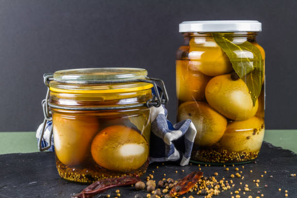 Two jars of pickled eggs. - fotografia de stock