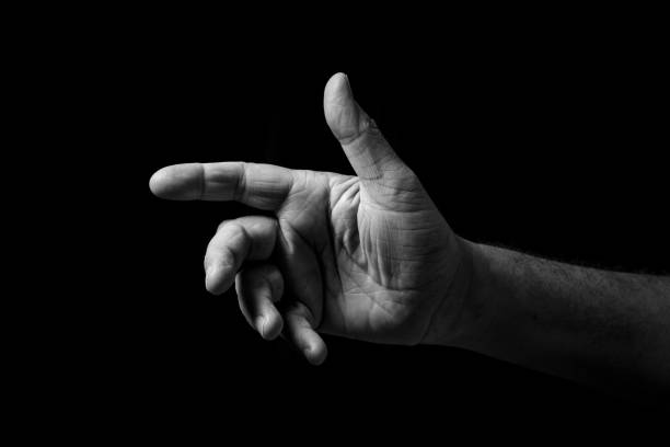 istock Male hand pointing, with palm out. 1347333901