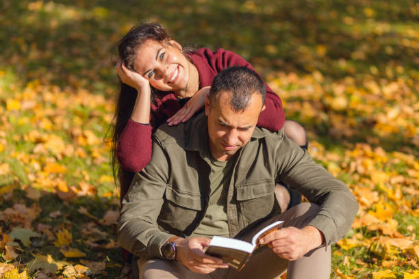 istock Lovely couple having fun together in nature. 1347334428