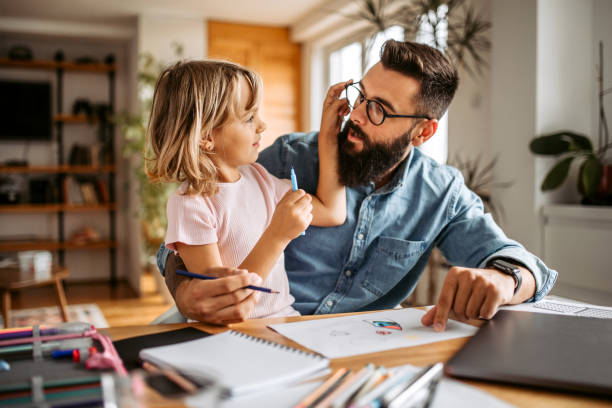 istock Assisting to daughter with homework 1347340047