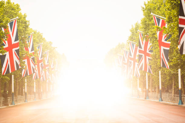 London Street with Union Jack flags London Street with Union Jack flags queen royal person photos stock pictures, royalty-free photos & images