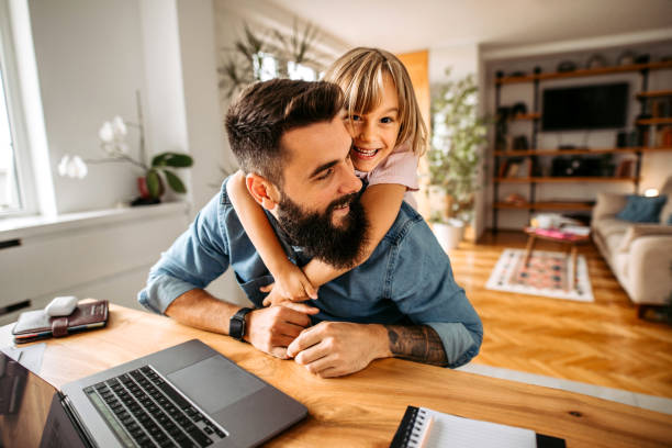 istock Father and daughter having fun at home 1347340878