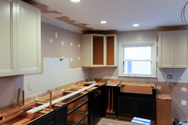 Kitchen remodel under construction A residential house installing a new kitchen with some of the cabenits put into place but much more work to go. home addition stock pictures, royalty-free photos & images