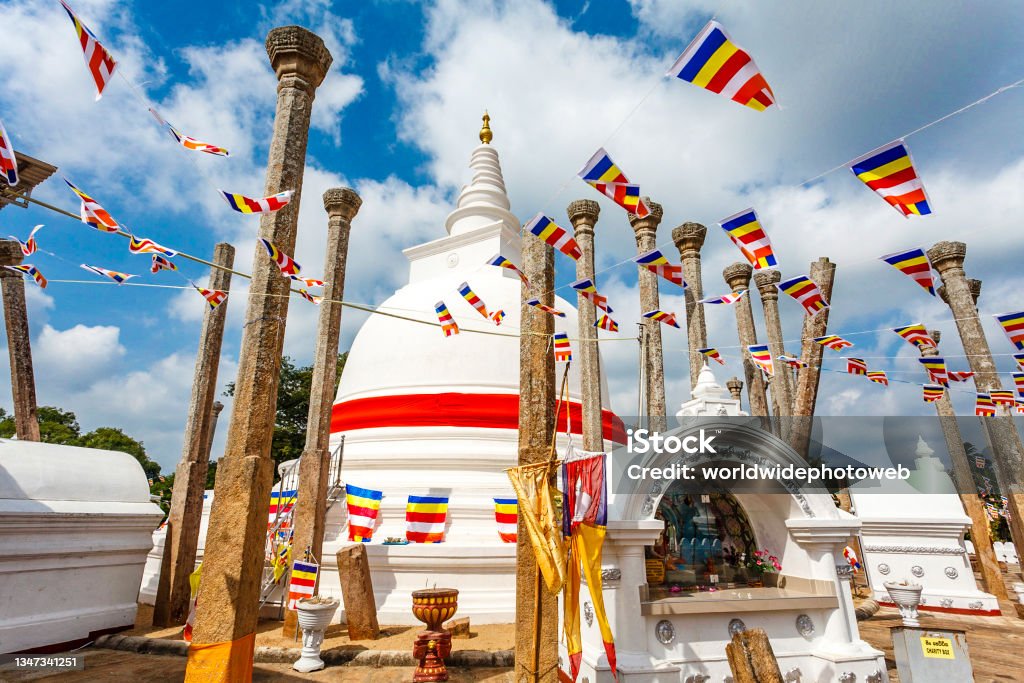 The white Thuparama dagoba with a red ribbon, Anuradhapura, Sri Lanka, Asia Sri Lanka Stock Photo