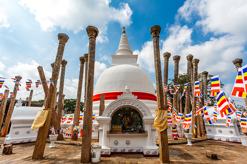 The white Thuparama dagoba with a red ribbon, Anuradhapura, Sri Lanka, Asia