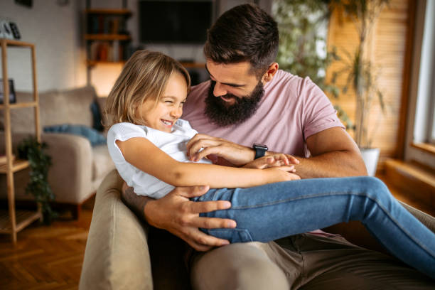 istock Father and daughter spending fun time together at home 1347343188