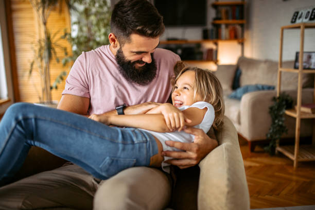 istock Father and daughter spending fun time together at home 1347343218
