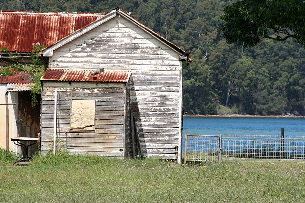 istock Little old lake house 134734403