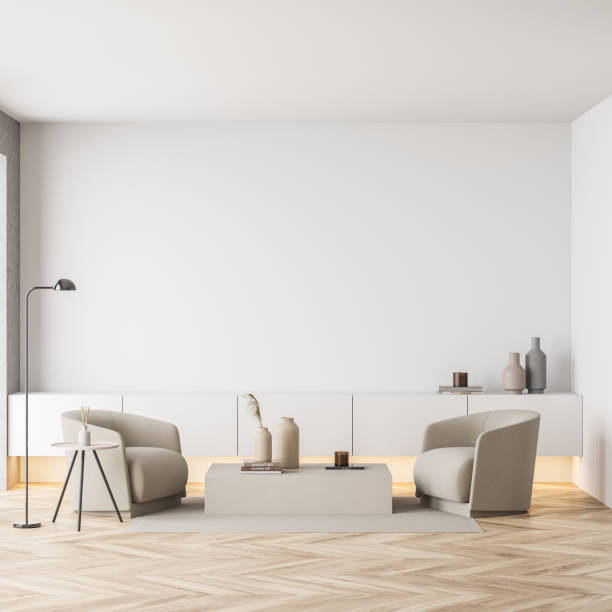 istock Bright living room interior with white empty wall, two armchairs 1347344235
