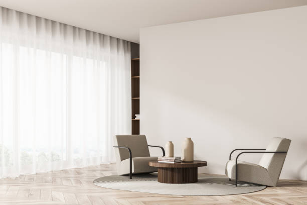istock Corner view on living room interior with empty white wall 1347346283