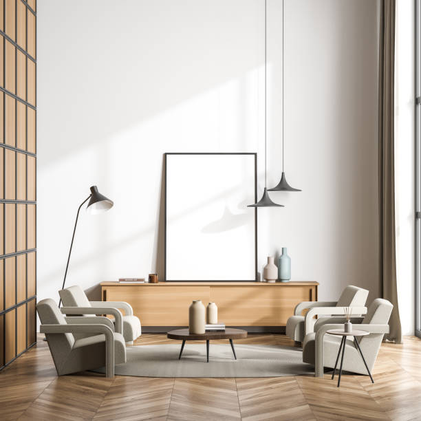istock Conversation seating with empty standing living room canvas next to white wall 1347347189