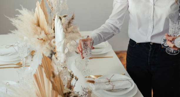 istock An Anonymous Woman Setting The Table for Lunch Party at Home 1347347523