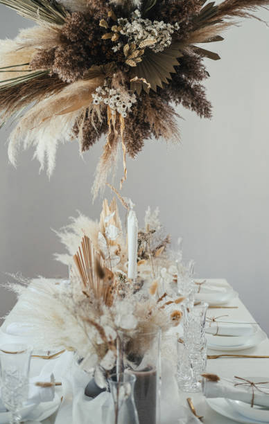 istock Dining Table Decorated with Dry Flower Arrangement for Birthday Celebration in a Restaurant 1347355196