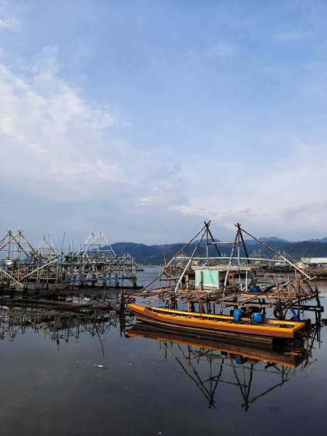 istock wooden boat on beach 1347356686