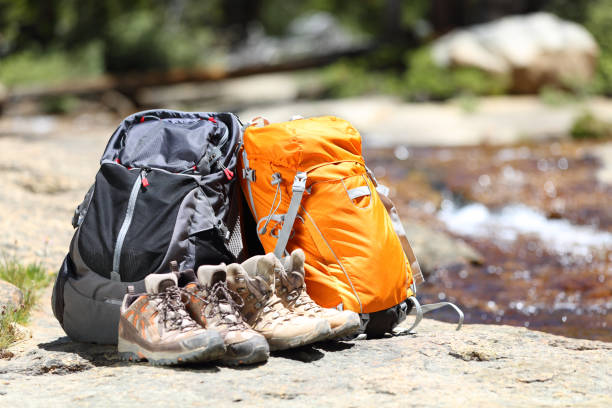 istock Hiking backpacks and hiker shoes 1347359743