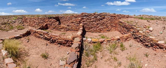 Attracted to the lush flood plain of the Paayu, native people arrived at Homolovi around 1330AD.  They came from the Hopi Mesas which are 60 miles north.  The Paayu is now known as the Little Colorado River.  About 750 to 1000 people lived here, in a 1200 room village.  They farmed corn, beans, squash and cotton in the flood plain and sand dunes.  They also gathered native wild foods growing in the area and hunted for beaver, antelope, deer, elk and waterfowl.  The Homolovi people left the Little Colorado River valley sometime prior to 1400AD and probably made their way back to their ancestral villages on the Hopi Mesas.  In the 1960’s the ancient dwellings were threatened by illegal collectors of ancient artifacts.  Homolovi State Park was eventually established to protect the artifacts and dwellings.  Homolovi State Park is near Winslow, Arizona, USA.