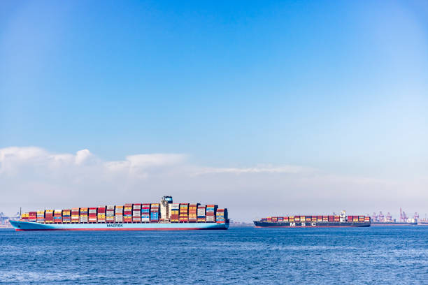 Container ships line the Port of Long Beach causing  long shipping delays amidst a global supply chain disruption threatening cargo and freight cargo ships ahead of holiday shopping season.