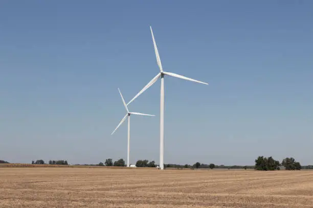 Photo of Wind Turbine Farm in Central Indiana. Wind and Solar Green Energy areas are becoming very popular in farming communities.