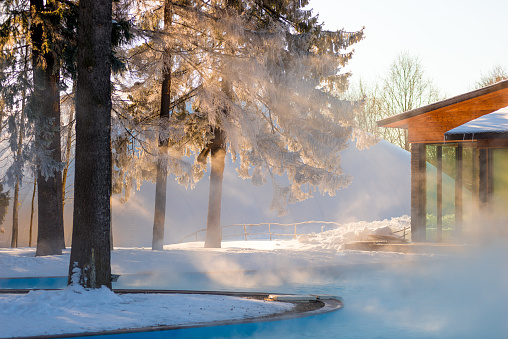 Outdoor swimming pool with warm water in winter