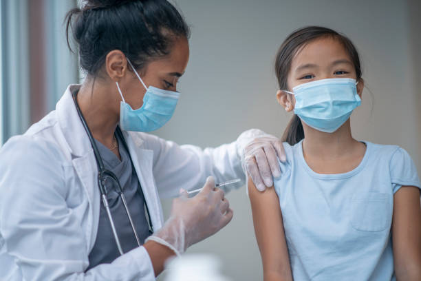 istock Young Girl Receiving a Vaccination 1347369492