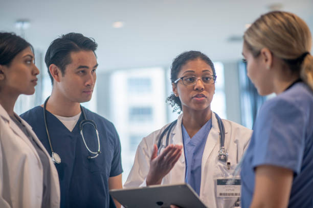 istock Standing Medical Team Meeting 1347369553