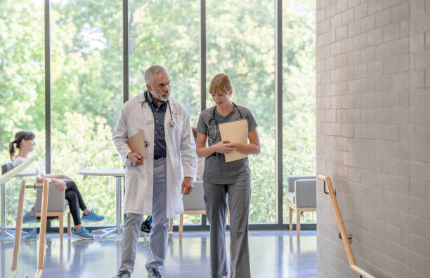 istock Medical Colleagues Walking Together 1347369785