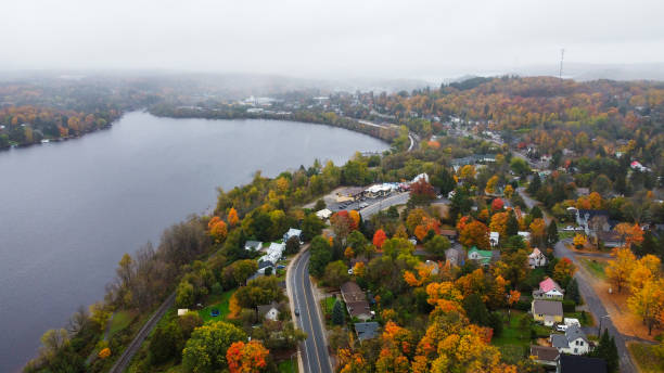 Autumn, aerial view, on a foggy morning over Muskoka . Ontario, Canada Autumn, aerial view, on a foggy morning over Muskoka . Ontario, Canada huntsville ontario stock pictures, royalty-free photos & images