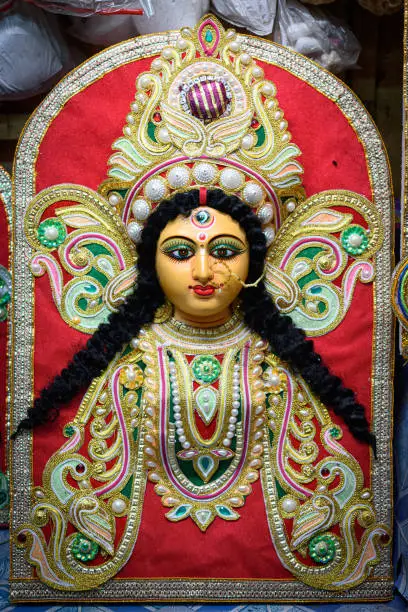 Goddess Devi Durga idol is under preparation for upcoming Durga Puja festival at a potter's studio in Kolkata. It is biggest festival of Hinduism, now celebrated all over the world.