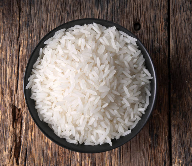 istock rice in a bowl on wooden 1347393366