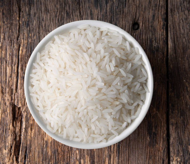 istock rice in a bowl on wooden 1347393374