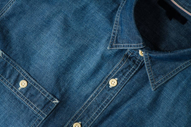 Closeup of Chambray jeans shirt, cloth and textile background concept
