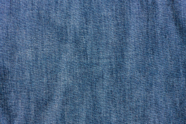 Closeup of Chambray jeans textile, cloth background