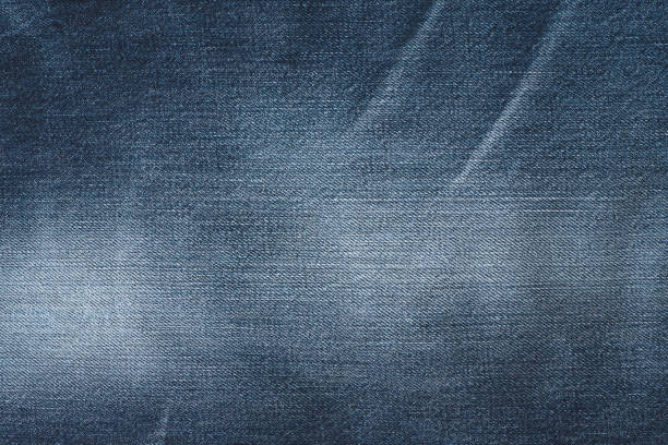 istock close up of Blue denim jean texture and background, 1347397140