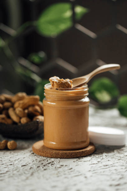 istock peanut paste and peanuts , a healthy food concept 1347398211