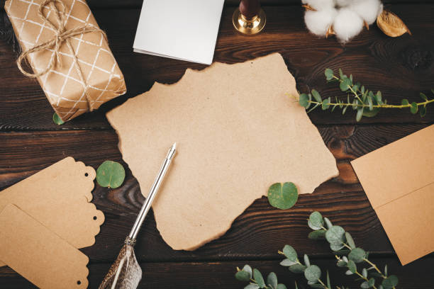 istock Writing holiday vintage style greeting card on wooden table, copy space 1347404919