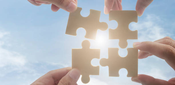 istock Connecting jigsaw puzzle. Business solutions success and strategy concept 1347405704