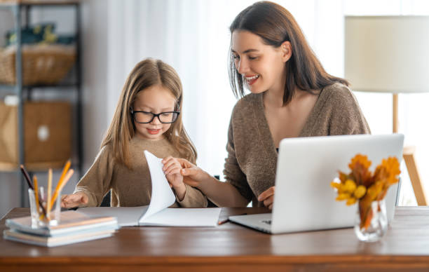 istock Girl doing homework or online education. 1347411101