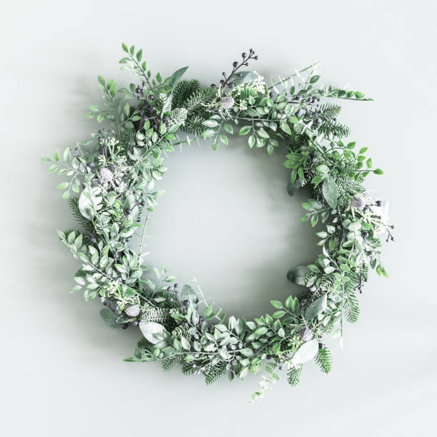 istock Christmas composition. Christmas wreath on pastel green background. Flat lay, top view 1347411457